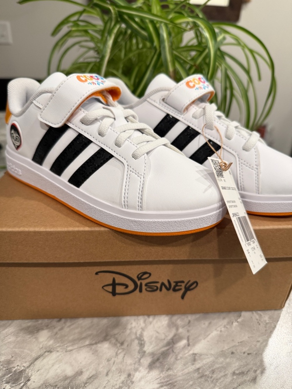 adidas Kids White Sneakers with Black Stripes and Orange Accents